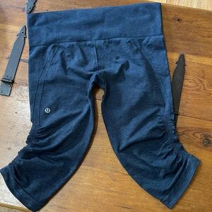 Lululemon In the Flow cropped leggings . Size 10. Dark Grey.